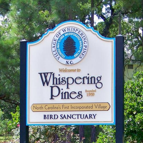 Whispering Pines sign