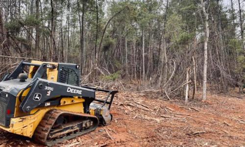 Forestry mulcher clearing land