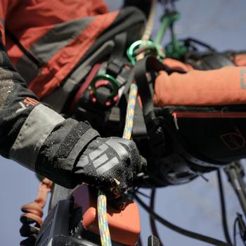 Close up of a climber's harness and rope while climbing